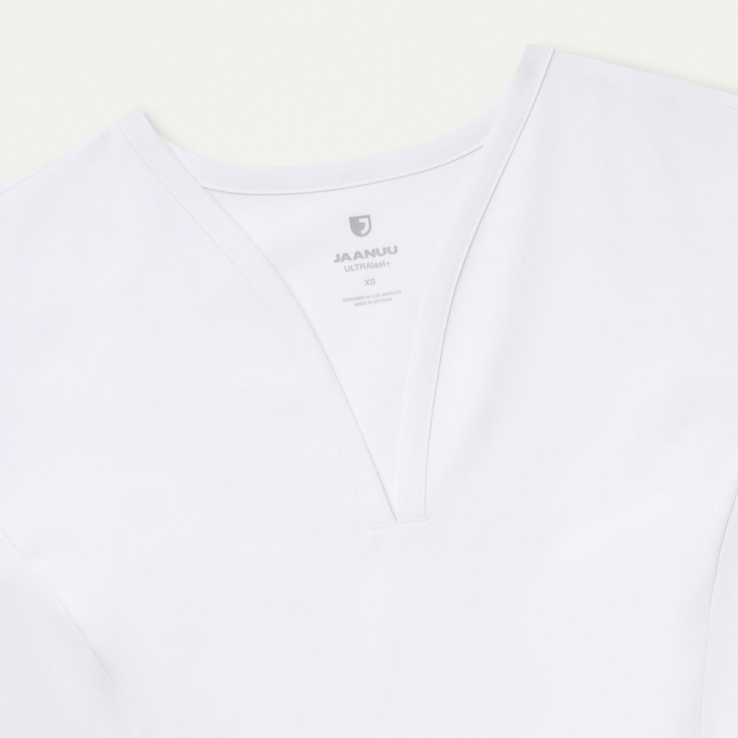 Calix Fit & Flare Scrub Top - White